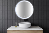 round backlit mirror hanging on wall in bathroom, vanity, bedroom, makeup mirror